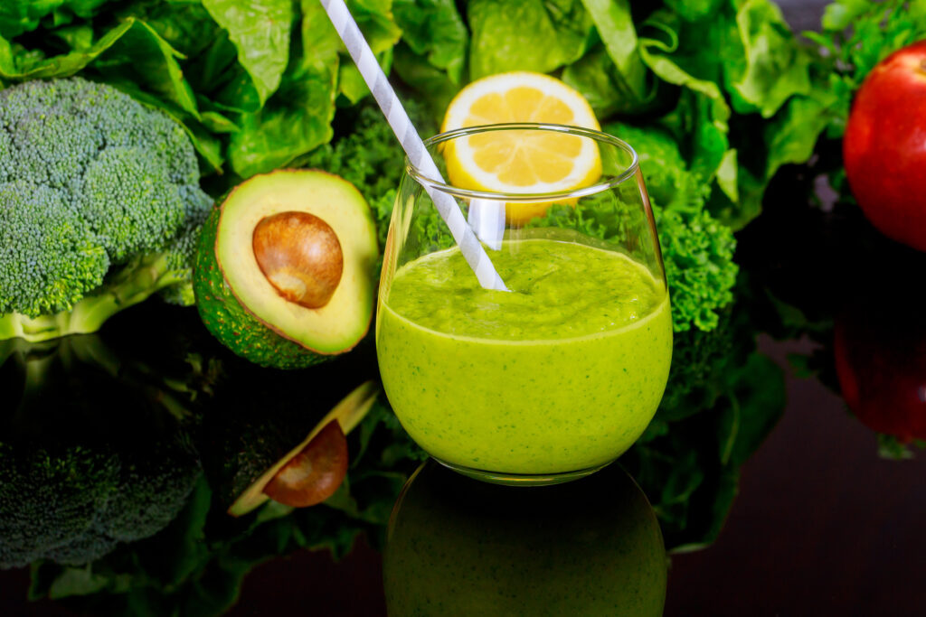 Vegetables,Healty,Smoothie,In,Glass,With,Straw,And,Ingredients,On